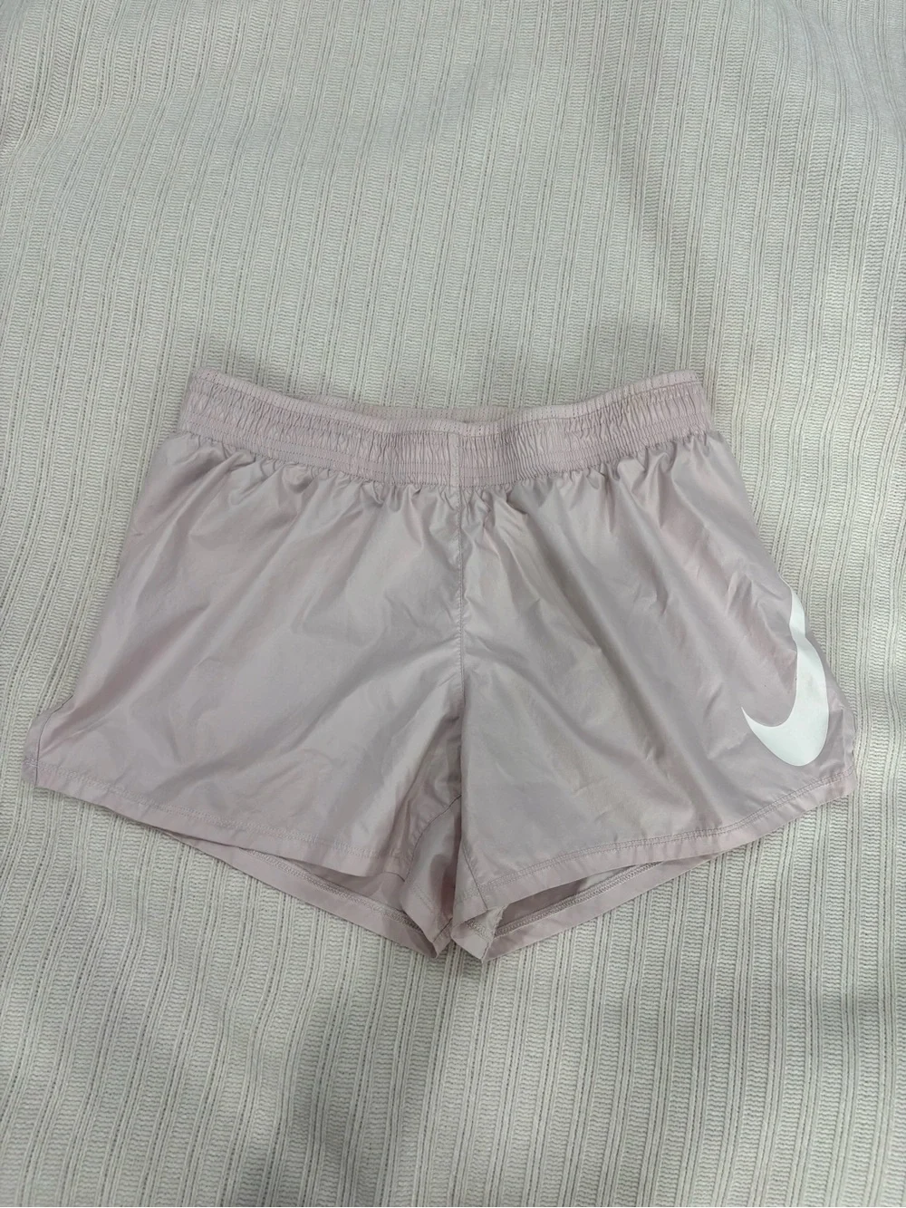 Nike Women’s Pale Pink Athletic Shorts with White Swoosh
